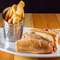 Chicken Parm Sub · Breaded chicken cutlet topped with marinara sauce and Mozzarella cheese with fries.