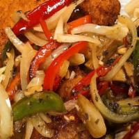 Grill House Chicken · Chicken cutlet topped with mushrooms onions and peppers sautéed in a white wine garlic sauce...