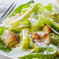 Caesar Salad · Made with Romaine lettuce, shaved Parmesan cheese & Seasoned homemade croutons