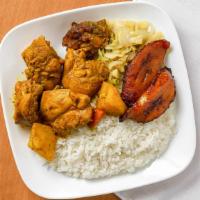 Curry Chicken · Chicken curried and simmered served with two sides.