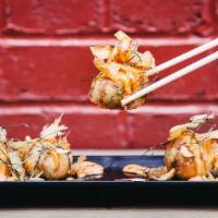 Takoyaki · Savoury deep-fried batter filled with diced octopus, topped with house-made spicy mayo, eel ...