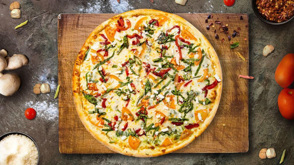 Mediterranean Pizza · Spinach, feta cheese, mozzarella cheese and marinated tomato, Romano, olive oil, and garlic baked on a hand-tossed dough.
