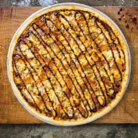 Bbq Chicken Pizza · Chicken, BBQ sauce, bacon and mozzarella baked on a hand-tossed dough.