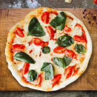 Caprese Flatbread Pizza · Tomatoes, garlic, fresh mozzarella, garlic and oil on freshly baked flatbread.