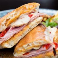 Cubano Panini · Grilled ham, roast pork house pickles, swiss & mustard.