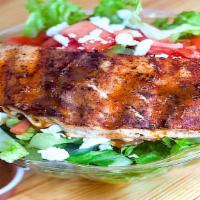 Grilled Salmon Salad · grilled salmon on a bed of fresh greens and topped with goat cheese and homemade chipotle  v...