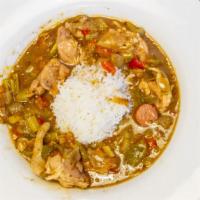 Gumbo · a bowl of goodness ! it contains shrimp, chicken and smoked beef sausage along with the trin...
