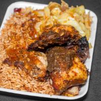 Curried Chicken · Served with Caribbean style rice or white rice, with cabbage or yard slaw, which consists of...
