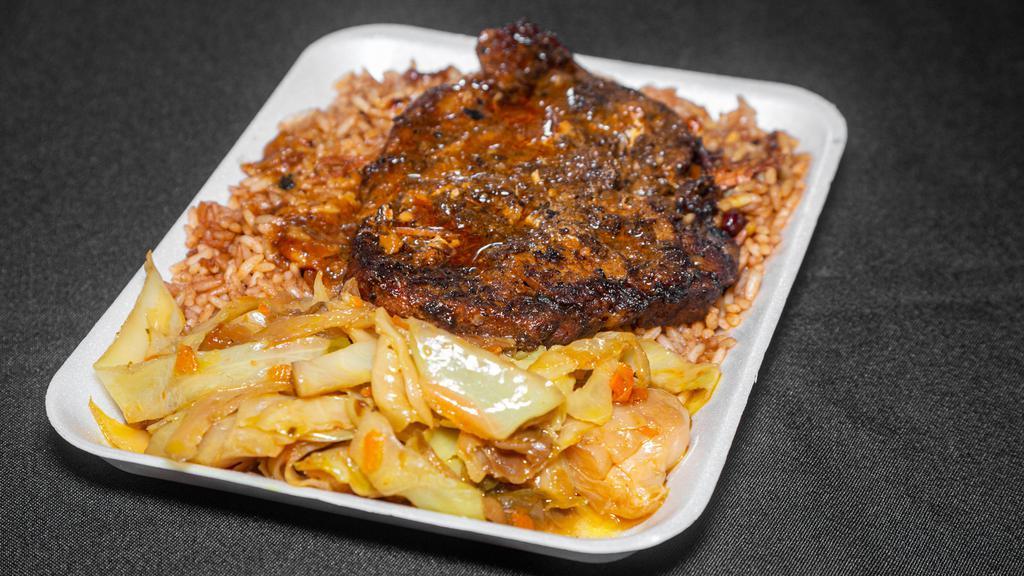 Jerk Pork · Spicy. Served with a tossed salad served with yard dressing, which consists of apple cider vinegar, honey, mustard, olive oil, and mango puree and two hearty portions of fried green or ripe plantains.