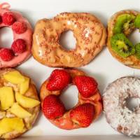 Fruity Donuts · Ever had a fruit flavored donut? Well, now you can!

(Made to order. Not all donuts are topp...