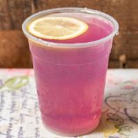 Magic Butterfly Lemonade · Magical color changing butterfly pea tea with lemon juice and our magic powder.