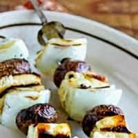 Haloumi Kabob Plate · Grilled haloumi cheese served with basmati rice, side salad, fresh pita and your choice of s...