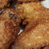 Chicken Wings · 6 pieces. Fried bone-in wings in seasoning.