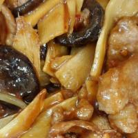 Hunan Pork · Spicy. Sliced pork sautéed with black mushrooms and bamboo shoots in a spicy black bean sauce.