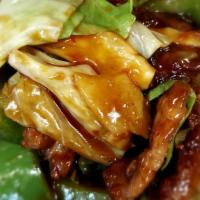 Twice Cooked Pork · Spicy. Sliced pork sautéed with cabbage, shiitake mushrooms, green pepper, bamboo shoots, an...