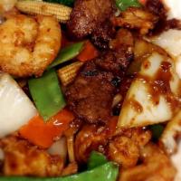 Triple Delight · Spicy. Shrimps, beef, and chicken with veggies in a special spicy ginger garlic sauce.
