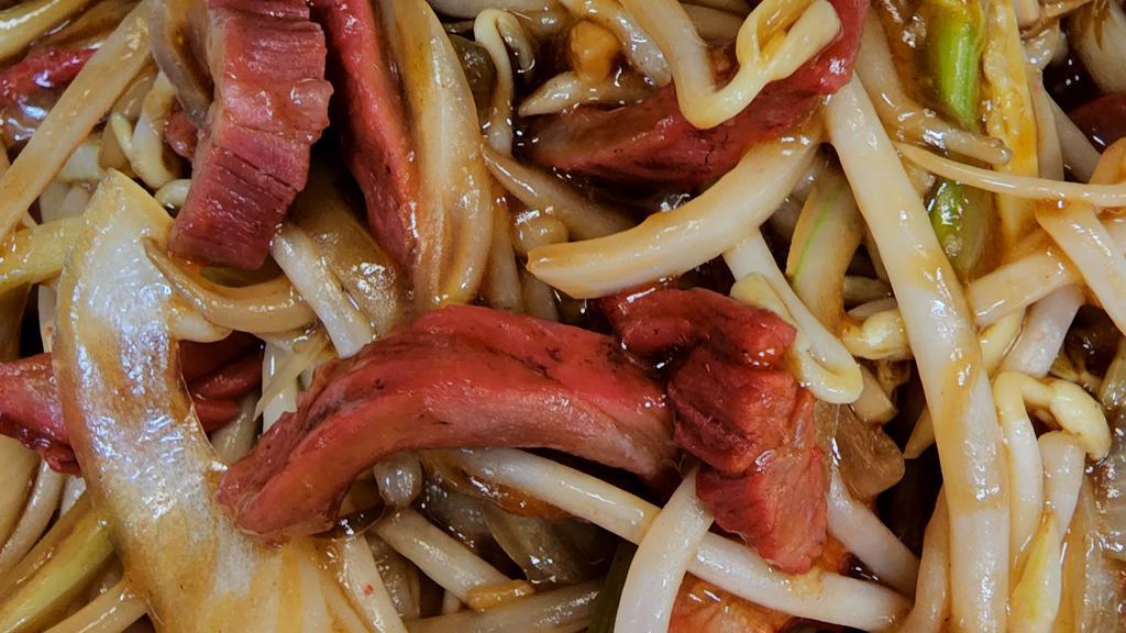 Chow Mein With Pork · With brown sauce and crispy stick noodles onside.