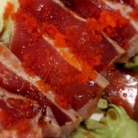 Tuna Tataki · Tuna that has been seared and is raw in the middle, serve with ponzu sauce.
