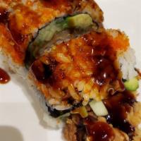 Spider Maki · Deep fried soft shell crab, cucumber, avocado, and tobiko, with eel sauce.