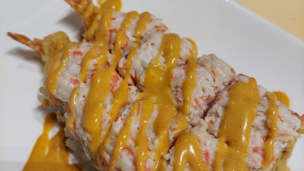 Phoenix Maki · Spicy. Shrimp tempura roll topped with imitation crabmeat and spicy mayo sauce.