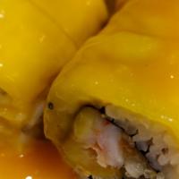 Ebi Mango Maki · Cooked shrimp, mango, tempura crumb, with sliced mango on top and special mango sauce.