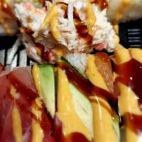 Tokyo Maki · Spicy. Imitation crab meat and avocado inside, topped with tuna, salmon, and shrimp, spicy m...