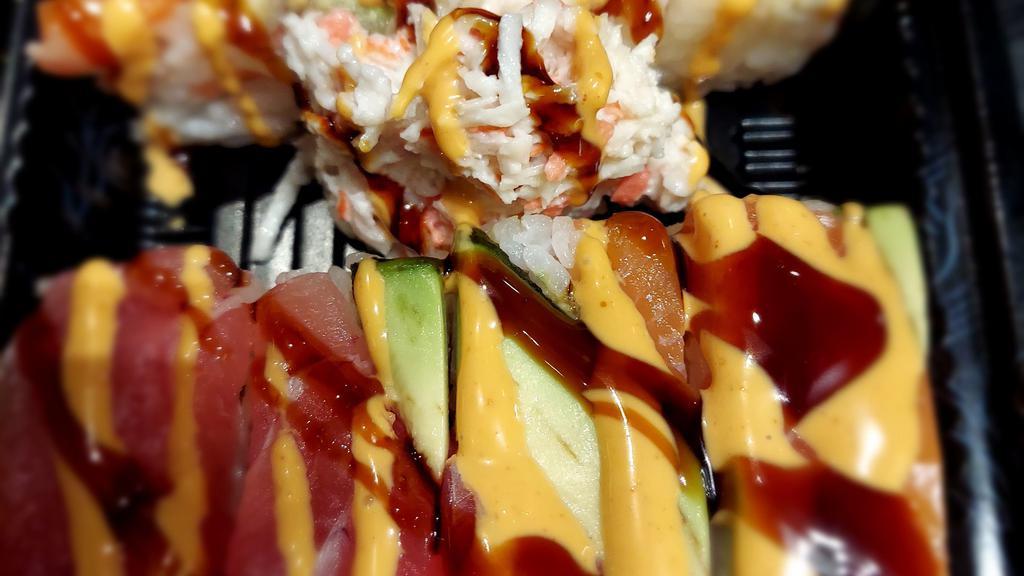 Tokyo Maki · Spicy. Imitation crab meat and avocado inside, topped with tuna, salmon, and shrimp, spicy mayo and eel sauce.