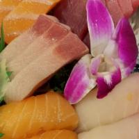 Sushi & Sashimi Combo · 9 pcs sashimi and 8 pcs nigiri.