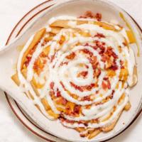 Loaded Fries · Topped with bacon, cheese wiz, mozzarella cheese, and ranch dressing.