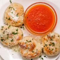 Garlic Knots · Served with marinara.