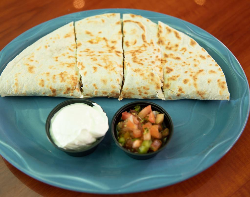 Steak Quesadilla · Toasted flour tortilla stuffed with cheese and your choice of grilled or shredded chicken. Served with a side of pico de gallo and sour cream