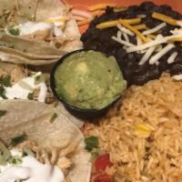 Rene'S Chicken Tacos · Three soft tacos (corn tortillas) with shredded chicken, sour cream, fresh guacamole and cho...