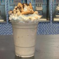Cookie Monster Shake · Cookie Monster shake is made with cookies and cream fro-yo blended with whole milk, Oreo cru...