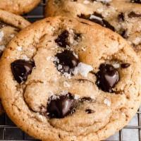 #1 Chocolate Chip · A chocolate chip cookie that has a sweet, crunchy, crumbly, buttery bite with a pop of handc...