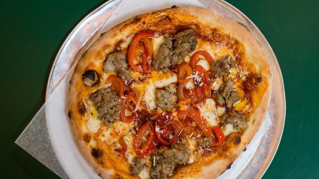 Stanley · Comet tomato sauce, housemade Italian fennel sausage, mozzarella, and roasted peppers.