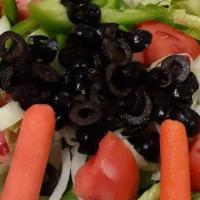 Garden Salad · Lettuce, , cucumbers, tomatoes, green peppers, onions and  olive.