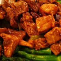 Kung Pao Chicken · Fresh chicken w/dry chili, green pepper, onion, water chestnuts, celery, peas, carrots and p...