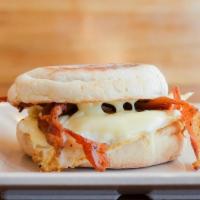 Sunrise · Egg, cheese, and your choice of ham, bacon or sausage on an English muffin.