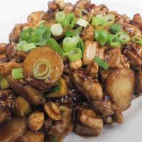 Kung Pao Chicken · With peanuts scallions zucchini water chestnuts and charred chili peppers. served with steam...