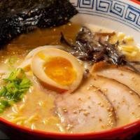 Isshindo Ramen · Our signature silky tonkotsu broth with scallions, wood ear mushroom, bean sprout, soy egg, ...