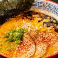 Spicy Miso Ramen · Tonkotsu broth spiked with our Savory red sauce & miso base served with scallions, bean spro...