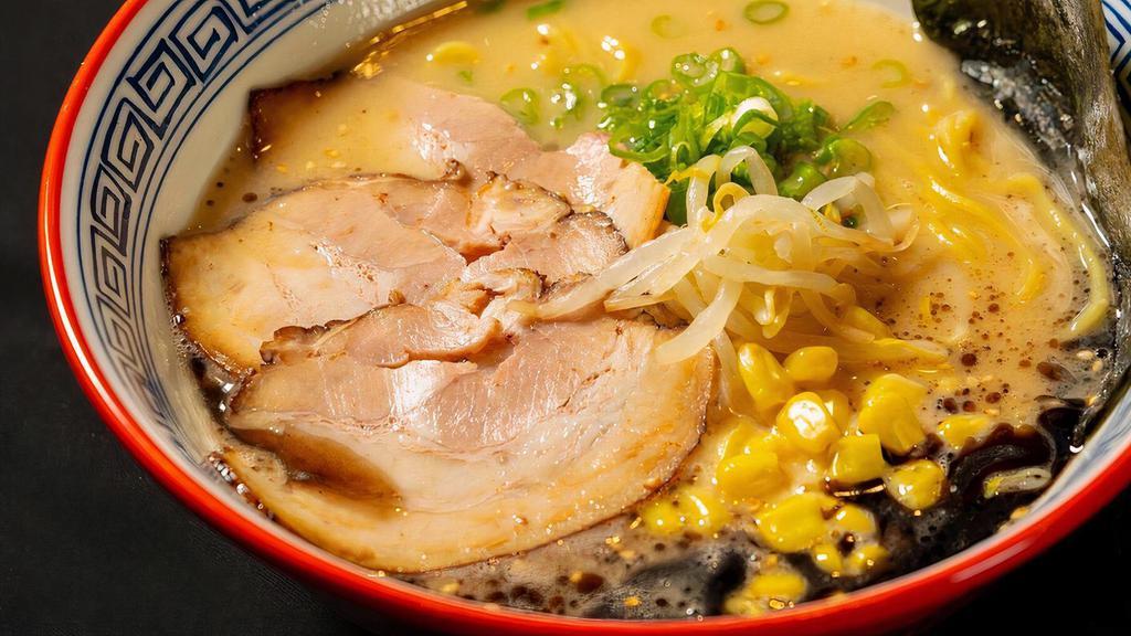 Miso Ramen · Tonkotsu broth with homemade miso flavored. Served with scallions, bean sprouts, sweet corn & ground pork char siu, black garlic oil.
