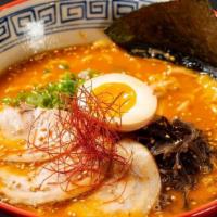 Karaka Men · Tonkotsu broth with spicy red sauce is mildy spicy served with wood ear mushroom, bean sprou...