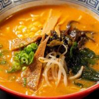 Tomato Veggie Ramen · Our special tomato base broth with scallions, wood ear mushrooms, bamboo shoots, corn, bean ...