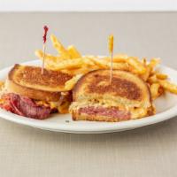 Grilled Reuben Specialty Sandwich · Corned beef with sauerkraut, melted swiss cheese and Russian dressing on rye.