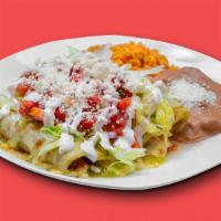 Enchiladas · Three corn tortillas, salsa Verde, topped with melted cheese, side of rice, refried beans, l...