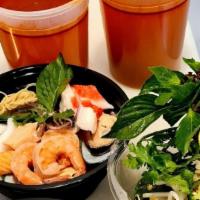 Sweet And Sour Pho · Pho infused with famous sweet, sour and spicy Thai flavors, topped with an assortment of shr...