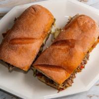 Steak Sub With Peppers · Juicy, sliced steak and grilled peppers served on a soft roll.