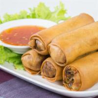 Egg Rolls (2) · Deep fried rolls filled with shredded cabbage and vegetables.
