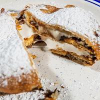 Deep-Fried Moonpie · Chocolate moon pie, battered and fried. Coated in powdered sugar.